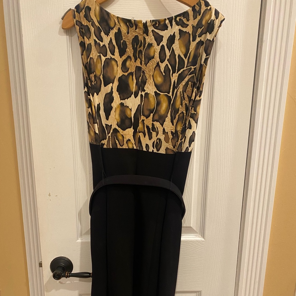 Cache Sophisticated dress from office to night out.